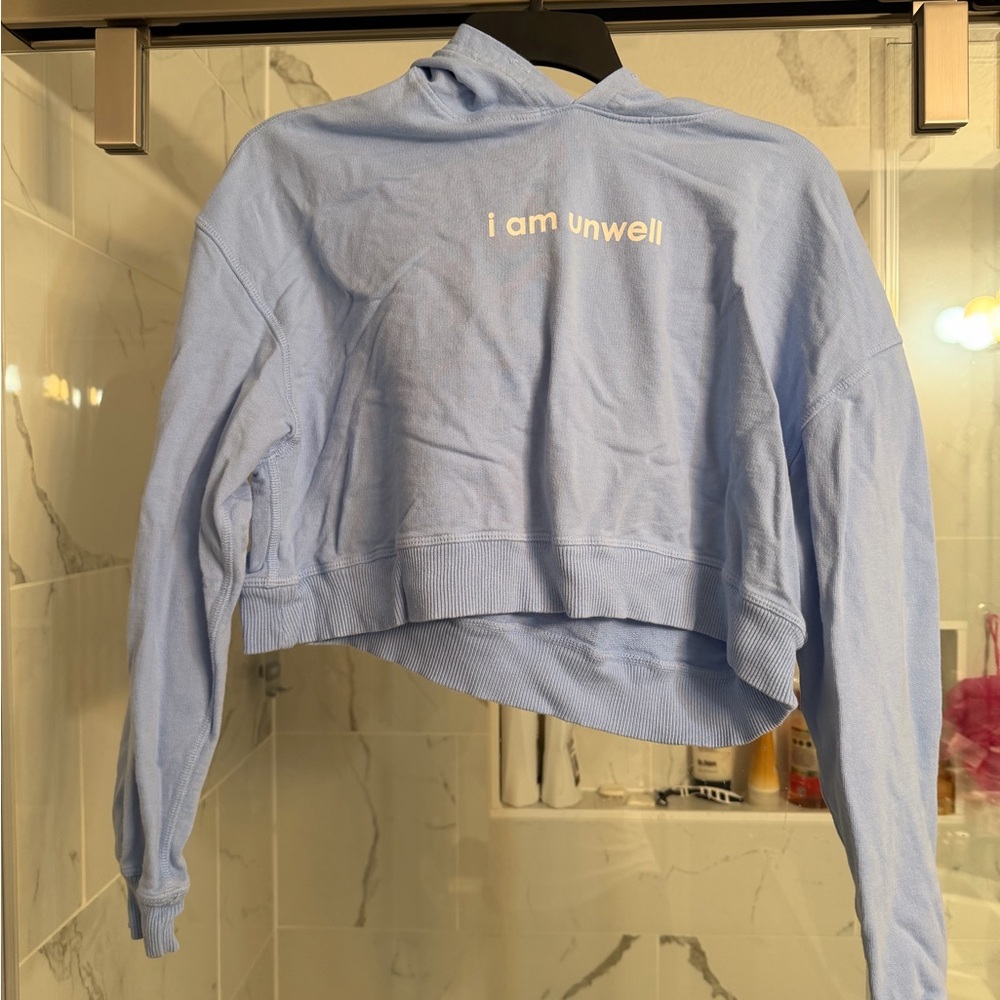 Light Blue Cropped Hoodie with Slogan